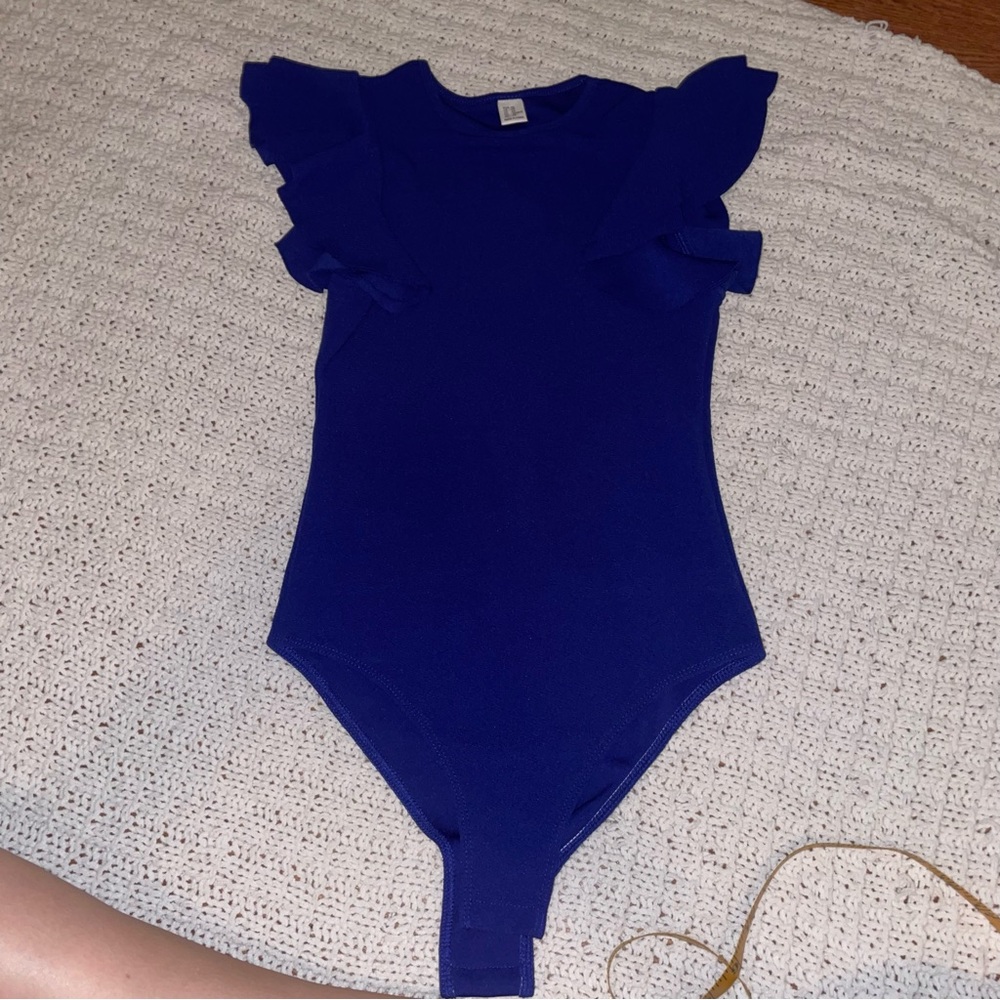 Amazon• blue ruffle sleeve bodysuit